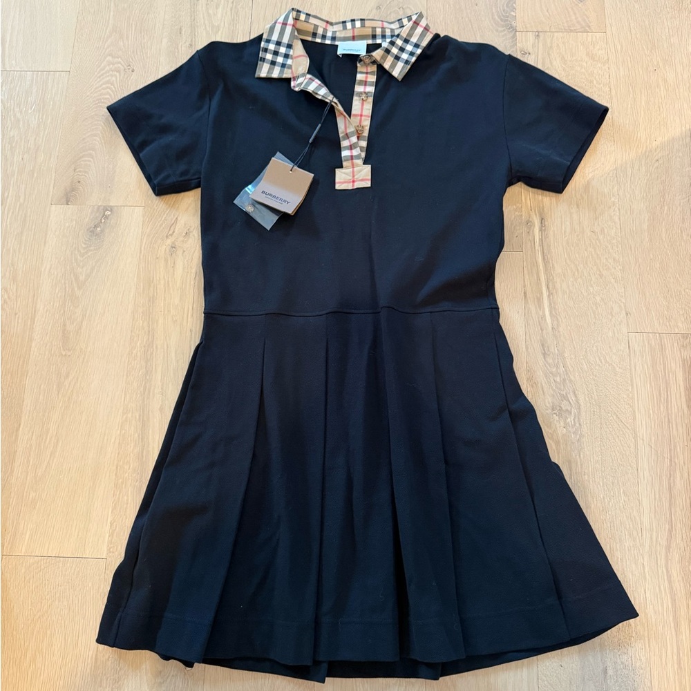 Burberry Black polo dress with Iconic Check Trim. New with tags. Size 14Y